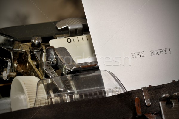 Text Hey Baby typed on old typewriter Stock photo © jarin13