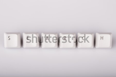 text search formed with computer keyboard keys on white backgrou Stock photo © jarin13