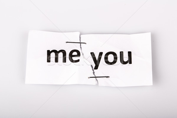 'ME YOU' words written on torn and stapled paper Stock photo © jarin13