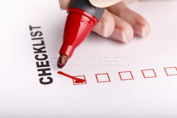 Checklist on white with marker and woman hand Stock photo © jarin13
