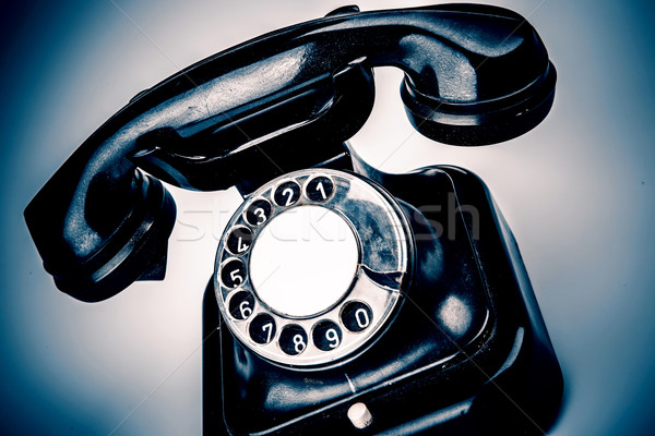 Vecchio nero telefono polvere bianco isolato Foto d'archivio © jarin13