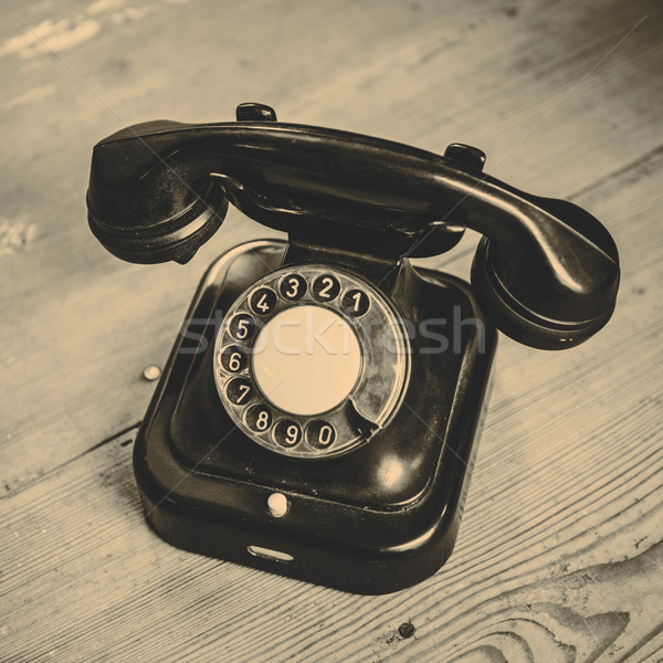 Oude zwarte telefoon stof geïsoleerd Stockfoto © jarin13