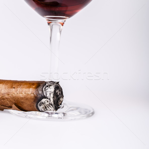 Beautiful cognac with cuban cigar on white background Stock photo © jarin13