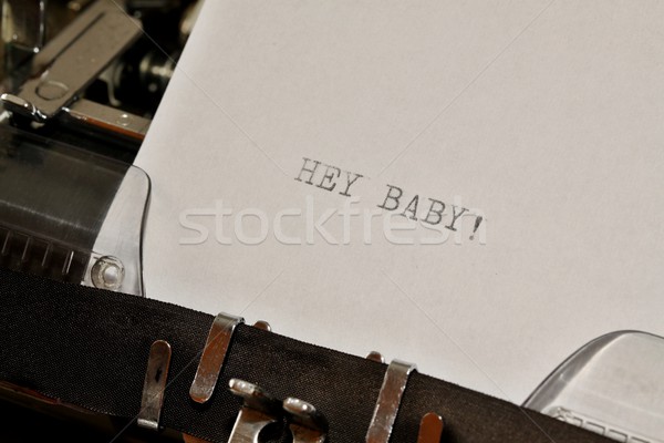 Text Hey Baby typed on old typewriter Stock photo © jarin13