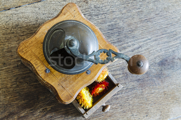 Vintage wooden coffee mill grinder with yellow flowers in open drawer Stock photo © jarin13