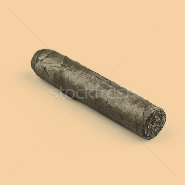 Expensive hand-rolled cigar on a while background Stock photo © jarin13