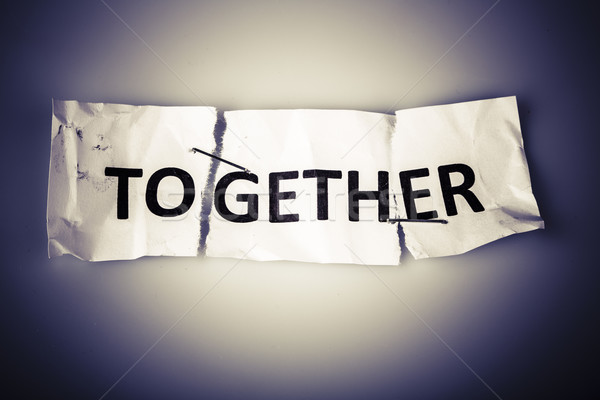 'TOGETHER' word written on torn and stapled paper Stock photo © jarin13