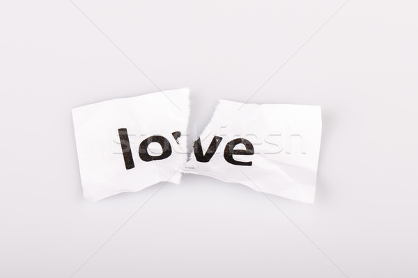 Miłości słowo napisany rozdarty papieru biały papieru Zdjęcia stock © jarin13