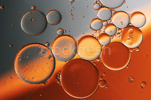 Oil drops on a water surface Stock photo © jarin13