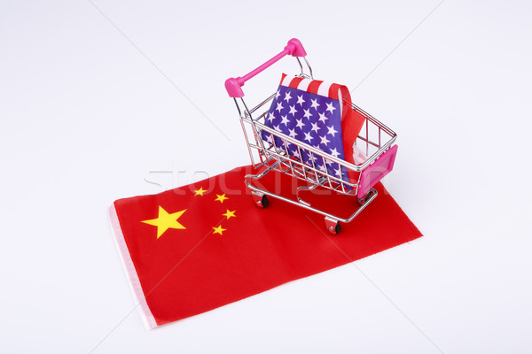 Shopping cart with USA flag on China flag Stock photo © jarin13