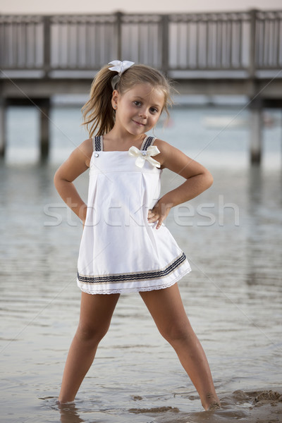 Posando menina beautiful girl praia pôr do sol crianças Foto stock © jarp17