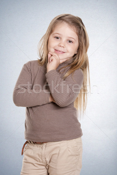 Menina pensando beautiful girl anos posando alegremente Foto stock © jarp17