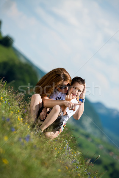 mother showing something to her son Stock photo © Jasminko