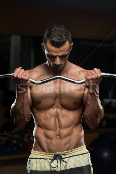 ボディービルダー 行使 上腕二頭筋 バーベル 筋肉の 男 ストックフォト © Jasminko