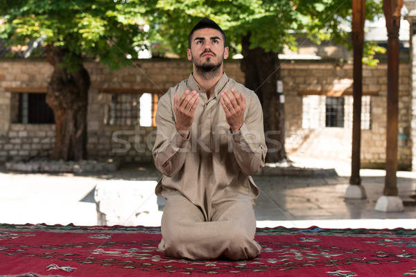 Muslim Praying In Mosque Stock photo © Jasminko