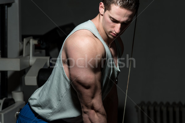 Fiatalember testmozgás tricepsz egészséges klub fiatal Stock fotó © Jasminko