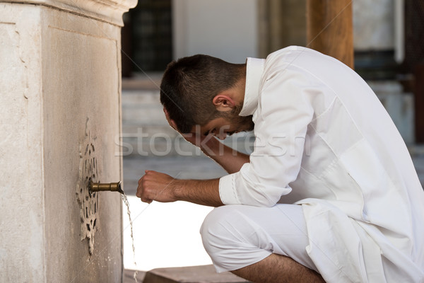 Islamic Religious Rite Ceremony Of Ablution Head Washing Stock photo © Jasminko