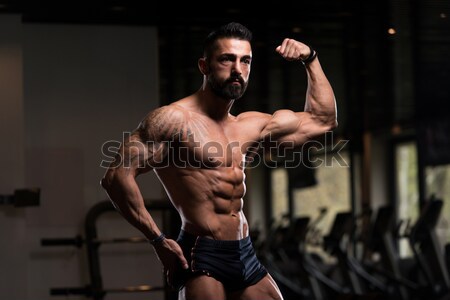 Maschio bodybuilder macchina uomo corpo palestra Foto d'archivio © Jasminko