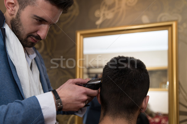 Friseur Haarschnitt erschossen gut aussehend Stock foto © Jasminko