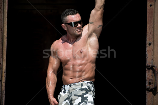 Muscular hombre tren metal poder masculina Foto stock © Jasminko