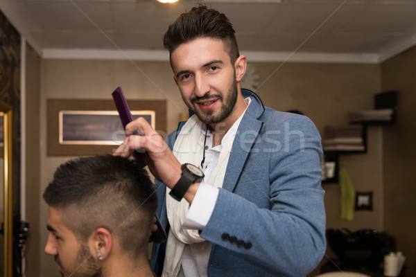 Stock photo: Professional Hairdresser With Short Hair Model