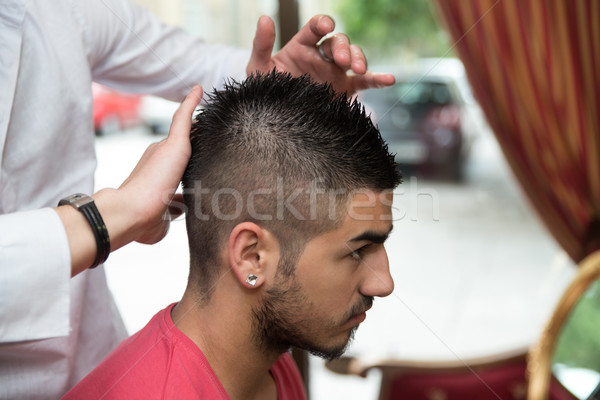 рук профессиональных волос стилист парикмахер молодым человеком Сток-фото © Jasminko