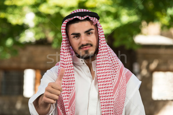 Arab Saudi Emirates Man Holding Thumbs Up Stock photo © Jasminko