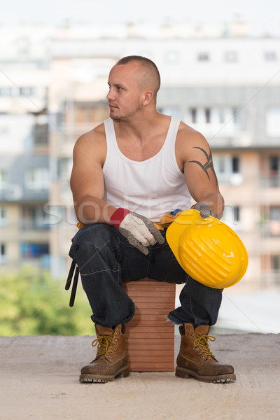 Zmęczony budowniczy cegły pracownik budowlany relaks Zdjęcia stock © Jasminko