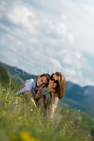 mother with son sitting and spreading love Stock photo © Jasminko