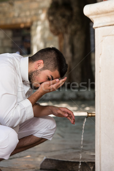 Islamic Religious Rite Ceremony Of Ablution Nose Washing Stock photo © Jasminko