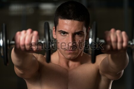 Kas adam egzersiz üç başlı kas genç vücut geliştirmeci Stok fotoğraf © Jasminko