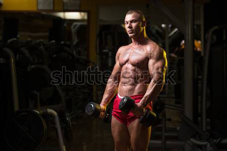 Pregătire sală de gimnastică partener incurajare om sportiv Imagine de stoc © Jasminko