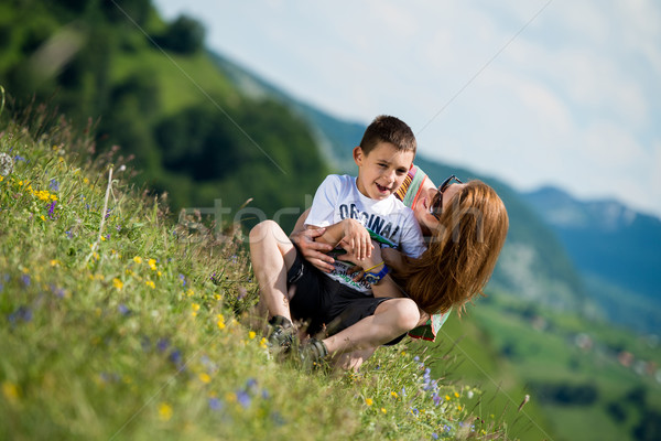 mother with son sitting and spreading love Stock photo © Jasminko