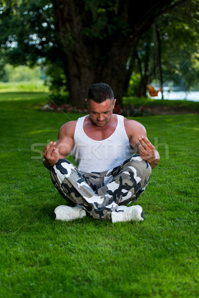 Man Doing Yoga Stock photo © Jasminko