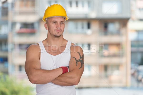 Ingenieur Bau tragen gelb Helm Porträt Stock foto © Jasminko