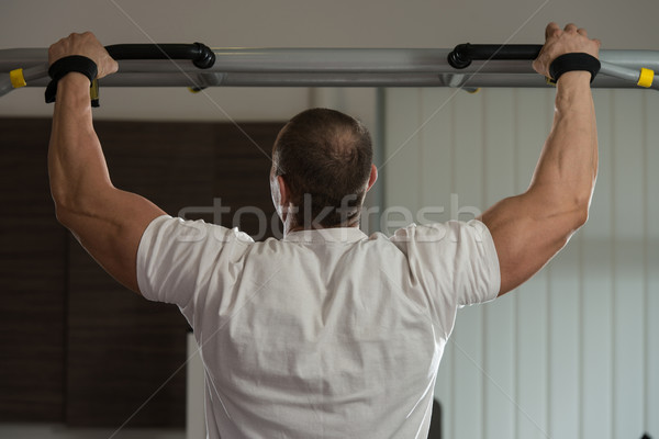 Male Athlete Doing Pull Ups Stock photo © Jasminko