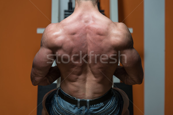Healthy Young Man Doing Exercise For Back Stock photo © Jasminko