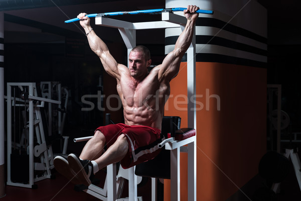 Fiatalember testmozgás jóképű férfi testmozgás fény erő Stock fotó © Jasminko