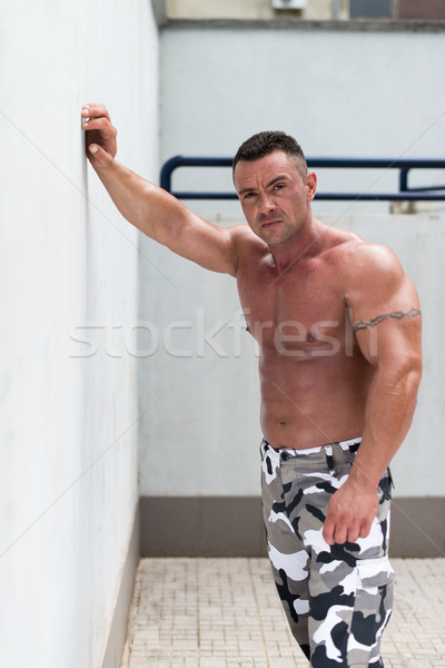 Stock photo: Muscular man, relaxation after work out