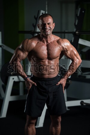 Mature Man Working Out In A Health Club Stock photo © Jasminko