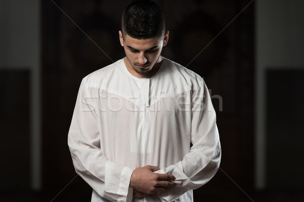 Stock photo: Close-Up Of Male Hands Praying In Mosque