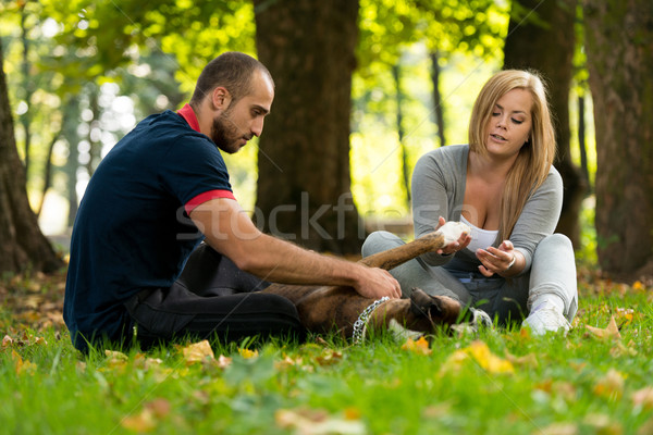 Stock photo: Happy Couple With German Boxer