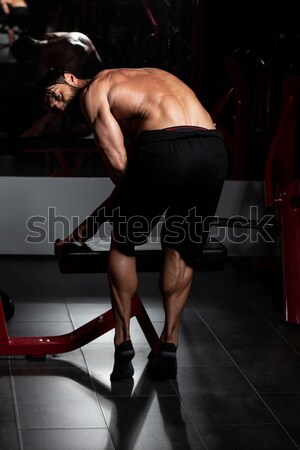 Stockfoto: Bodybuilder · tonen · reusachtig · benen · jonge · spieren