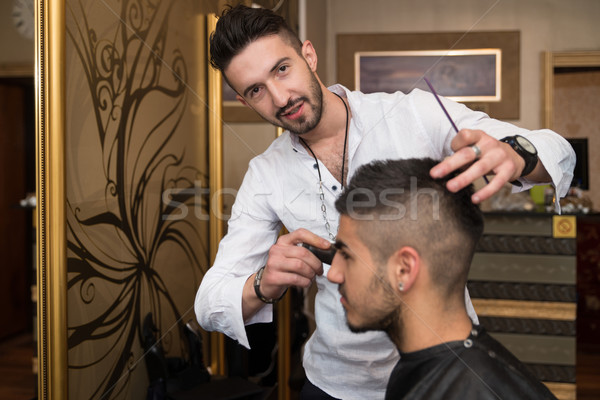 Friseur Reinigung junger Mann Haarschnitt gut aussehend jungen Stock foto © Jasminko