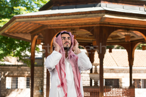 Young Muslim Man Praying Stock photo © Jasminko