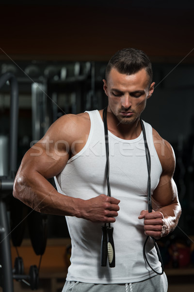 Handsome Muscular Men With Jumping Rope Stock photo © Jasminko