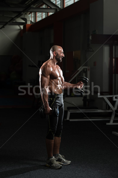 Stock fotó: érett · férfi · testmozgás · súlyzó · edz · bicepsz · egészség