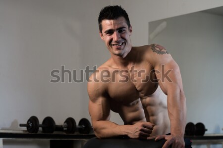 Masculino musculação posando preto camisas homem Foto stock © Jasminko