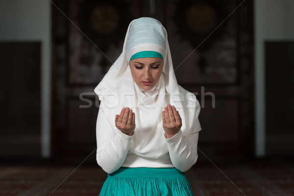 Muslim Woman Is Praying In The Mosque Stock photo © Jasminko