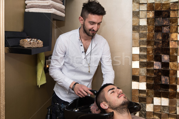 Portrait Of Male Client Getting His Hair Washed Stock photo © Jasminko